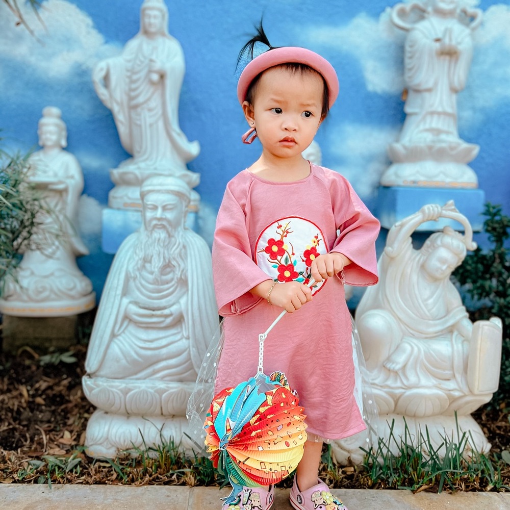 Two children’s áo dài